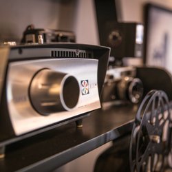 Summit Video Services - Antique film and video projector in video production company in Lee's Summit, MO