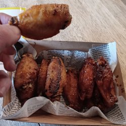 Mums Burger Kitchen - Half honey soy. Half BBQ. 10 Pack of wings.