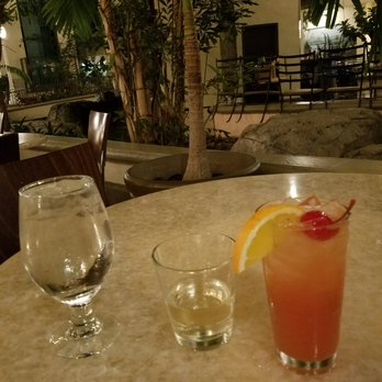 Grill 305 - Miami punch with prossecco. He gave me a little extra. Nice - American Near Me - Miami, Florida
