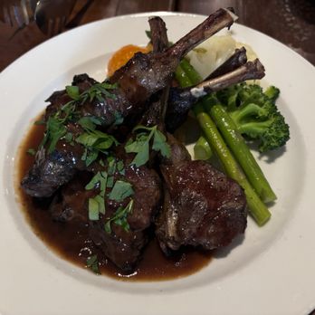 Poor Italian - GRILLED LAMB CHOPS - 48 (GF) Grilled Lamb Chops, Fresh Garlic, Mediterranean Sea Salt and Cracked Black Pepper with Rosemary Jus Finish - Italian Near Me - Vancouver, British Columbia Poor Italian - GRILLED LAMB CHOPS - 48 (GF) Grilled Lamb Chops, Fresh Garlic, Mediterranean Sea Salt and Cracked Black Pepper with Rosemary Jus Finish - Italian Near Me - Vancouver, British Columbia
