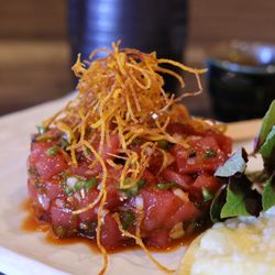 Miku Asian Kitchen & Bar - Tuna Tartare: Minced marinated tuna, balsamic glaze wonton chip.