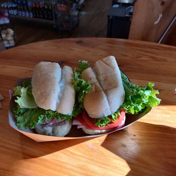 The Batesville Market - a sandwich with lettuce and tomatoes - Delis Near Me - Batesville, Virginia