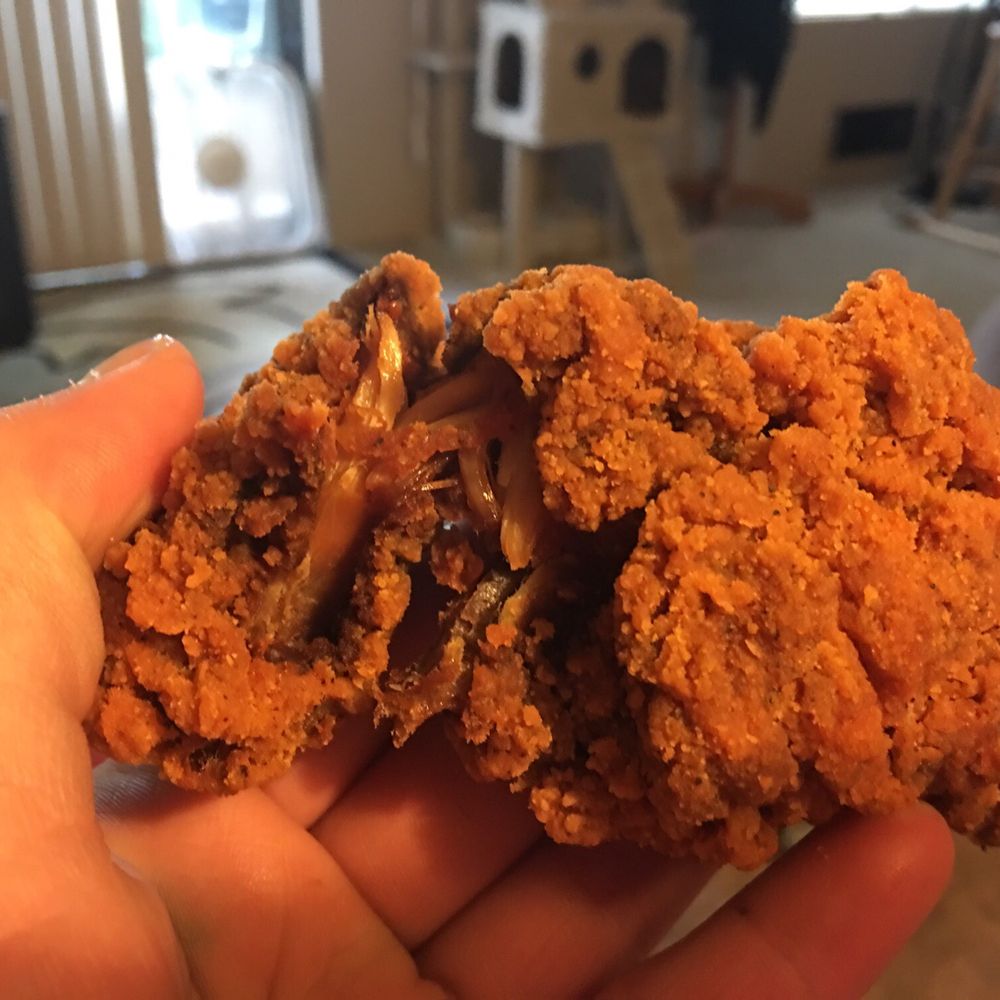 Safeway - a hand holding a half eaten fried chicken - Grocery Near Me - Lake Stevens, Washington Safeway - a hand holding a half eaten fried chicken - Grocery Near Me - Lake Stevens, Washington
