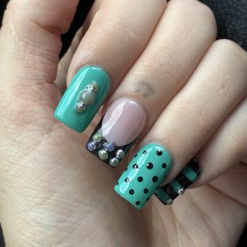 D’Limo Nail Lounge - An example of the stones turning green and purple. they were a nice silver before. - Nail Salons Near Me - Houston, Texas D’Limo Nail Lounge - An example of the stones turning green and purple. they were a nice silver before. - Nail Salons Near Me - Houston, Texas