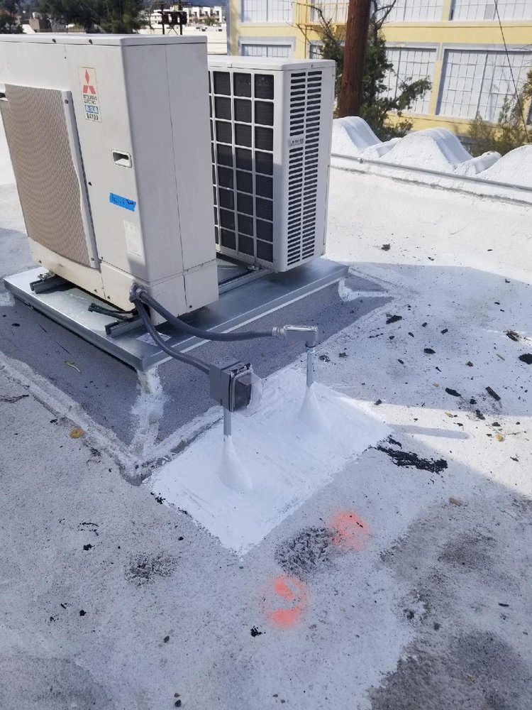 Slide of Huncho Roofer