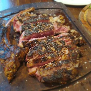 Nusr-Et Steakhouse - Sliced tomahawk steak - Steakhouses Near Me - Miami, Florida