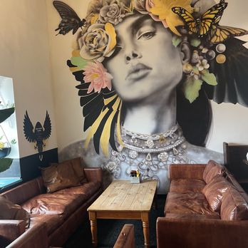 410 Social - Lived in leather couch with corner dining with big window for people watching. - Sports Bars Near Me - Berlin, Maryland