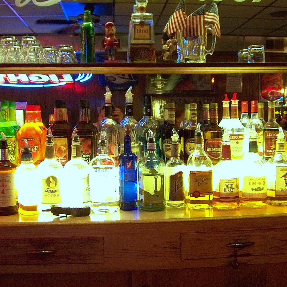 North End Tavern - liquor bottles on a bar counter - Bars Near Me - De Soto, Missouri North End Tavern - liquor bottles on a bar counter - Bars Near Me - De Soto, Missouri