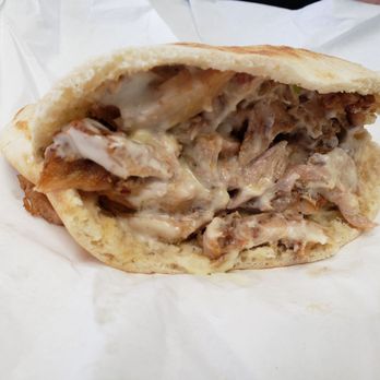 Shawarma Empire - Chicken shawarma topped with garlic sauce. - Middle Eastern Near Me - Scarborough, Ontario Shawarma Empire - Chicken shawarma topped with garlic sauce. - Middle Eastern Near Me - Scarborough, Ontario