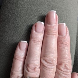 Two weeks after getting a micro french manicure and it's holding strong. Love my nails, Kim! Two weeks after getting a micro french manicure and it's holding strong. Love my nails, Kim!