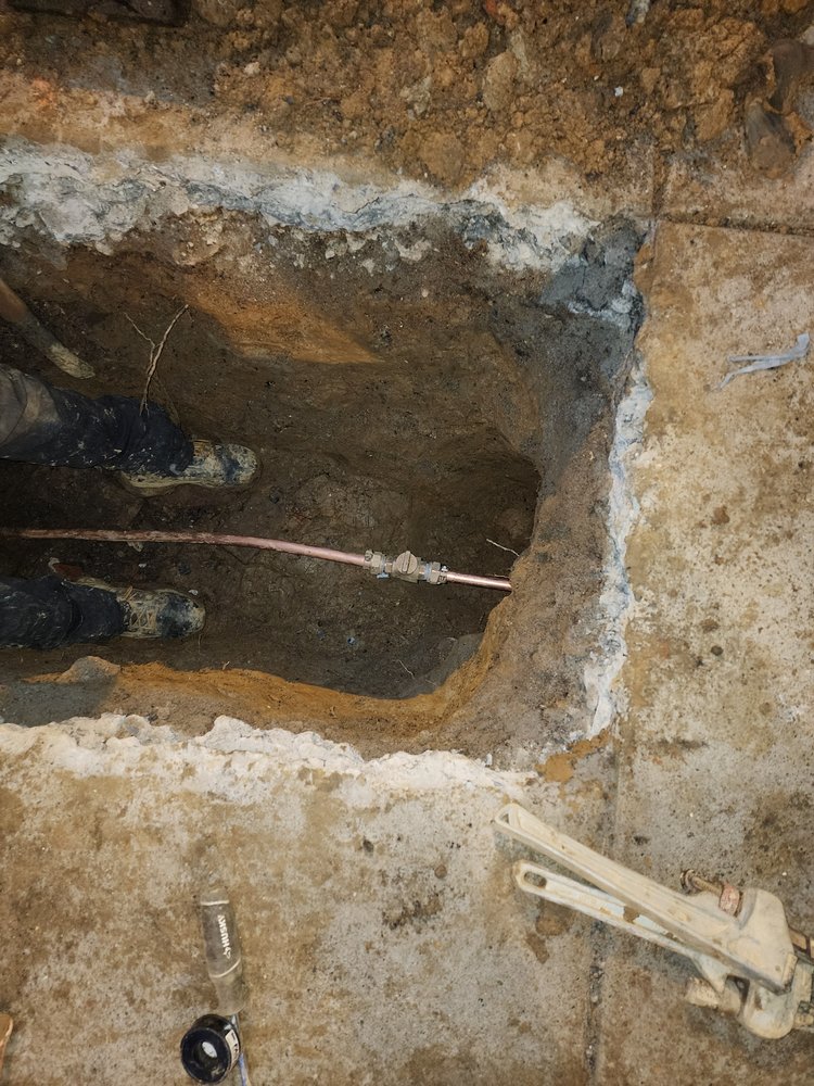 Slide of Trademark Plumbing and Heating