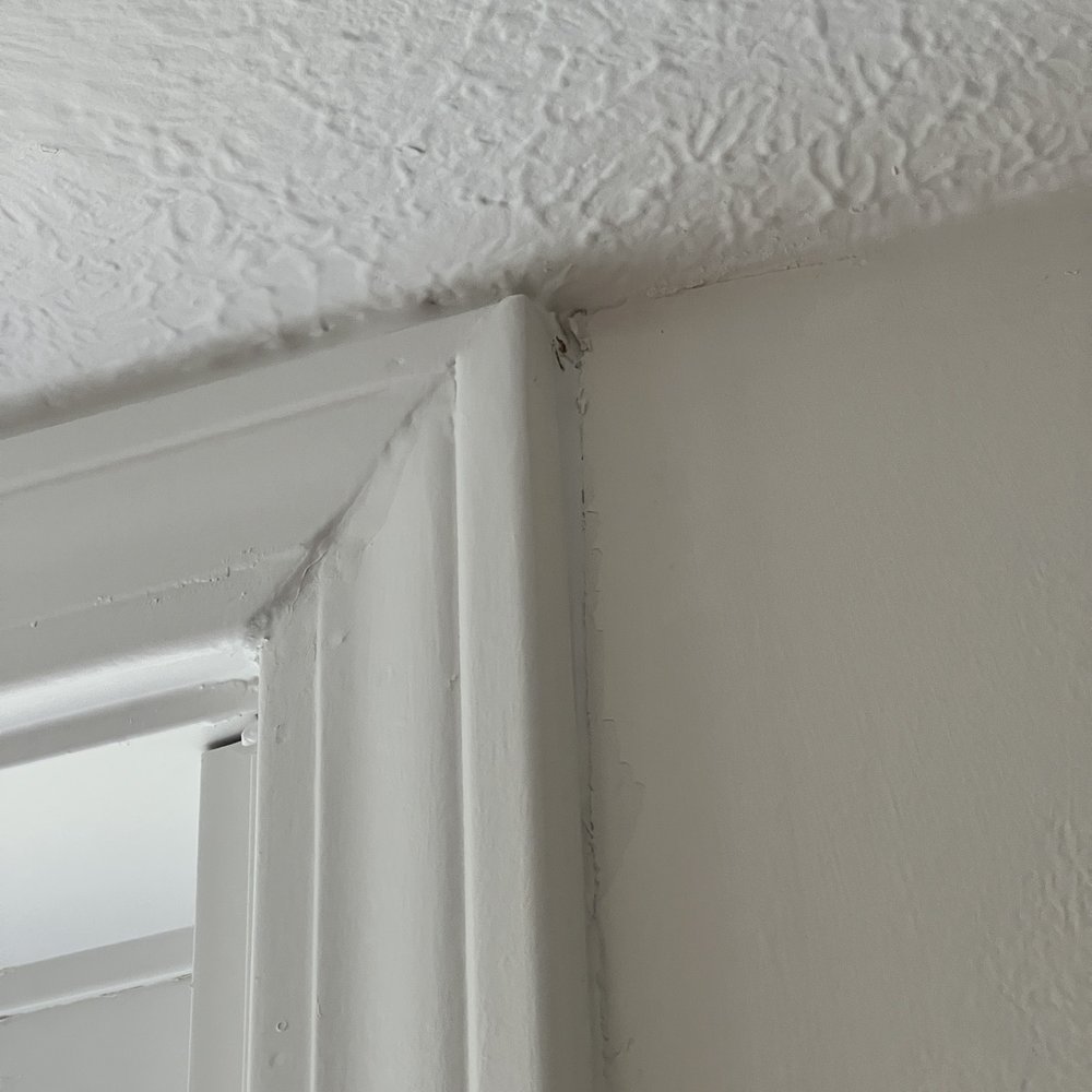 Harmony Designs Painting - No sanding on the trim for a nice finish and crappy caulk job - Painters Near Me - Elkhart, Indiana Harmony Designs Painting - No sanding on the trim for a nice finish and crappy caulk job - Painters Near Me - Elkhart, Indiana
