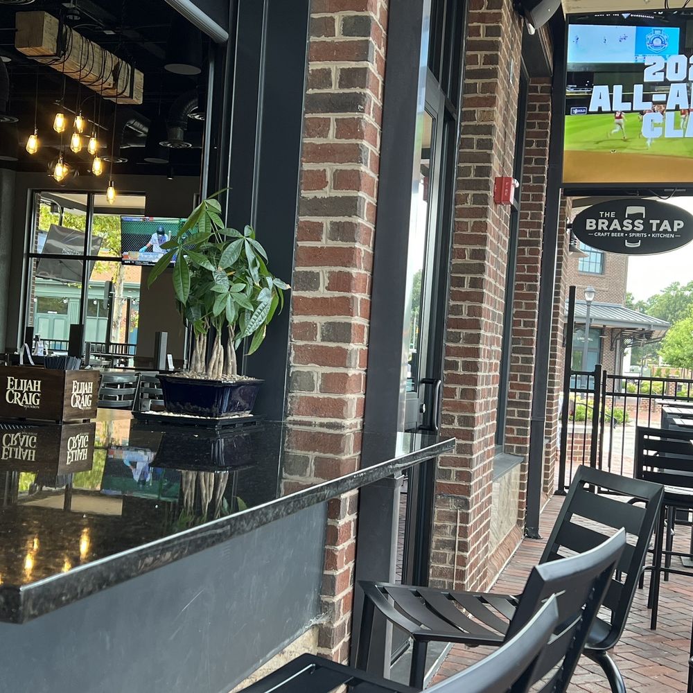The Brass Tap - Patio seating and partial view inside the restaurant. - Beer, Wine & Spirits Near Me - Richmond, Virginia The Brass Tap - Patio seating and partial view inside the restaurant. - Beer, Wine & Spirits Near Me - Richmond, Virginia