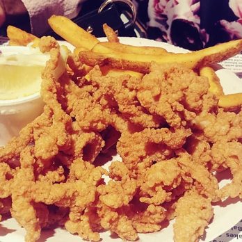 Flo's Clam Shack - These are the clam strips. They are amazing! - Seafood Near Me - Middletown, Rhode Island Flo's Clam Shack - These are the clam strips. They are amazing! - Seafood Near Me - Middletown, Rhode Island