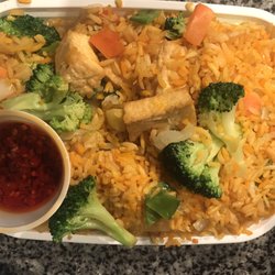 China King - Perfect veggie fried rice with added fried tofu with their homemade hot chili oil! They make it better than all other places I've tried.
