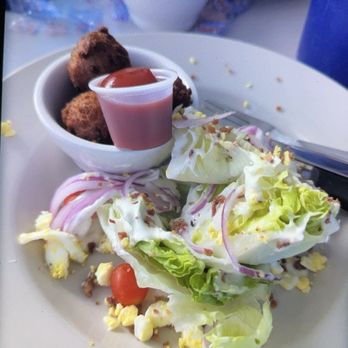 Commander's Shellfish Camp - Wedge salad and hush puppies - Bars Near Me - St. Augustine, Florida