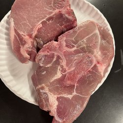Keller Meats & Market - The chop at the top was what I expected both to be. The one at the bottom has a large bone in the center of it.