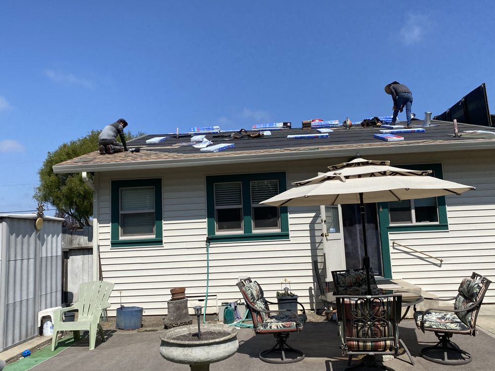 Slide of Urrutia Roofing