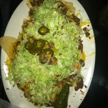 Cafe Del Rio - The nacho appetizer without tomatoes, sour cream & guac. - Tex-Mex Near Me - Mesquite, Texas Cafe Del Rio - The nacho appetizer without tomatoes, sour cream & guac. - Tex-Mex Near Me - Mesquite, Texas