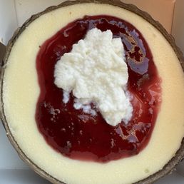Warm, mushy raspberry cheesecake with soft warm and lumpy cream cheese!