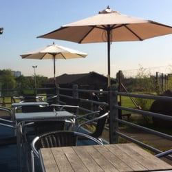 The Coffee Club - Making the most of the weather, dining alfresco overlooking the golf range.