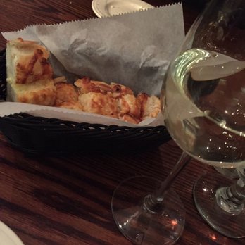 Salute - The infamous garlic cheese bread featuring my Sauvignon blanc - Italian Near Me - Hartford, Connecticut