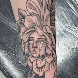 Exotic Sensations Tattoos - Flower girl tattoo done by shop owner and artist Glenn Meurs