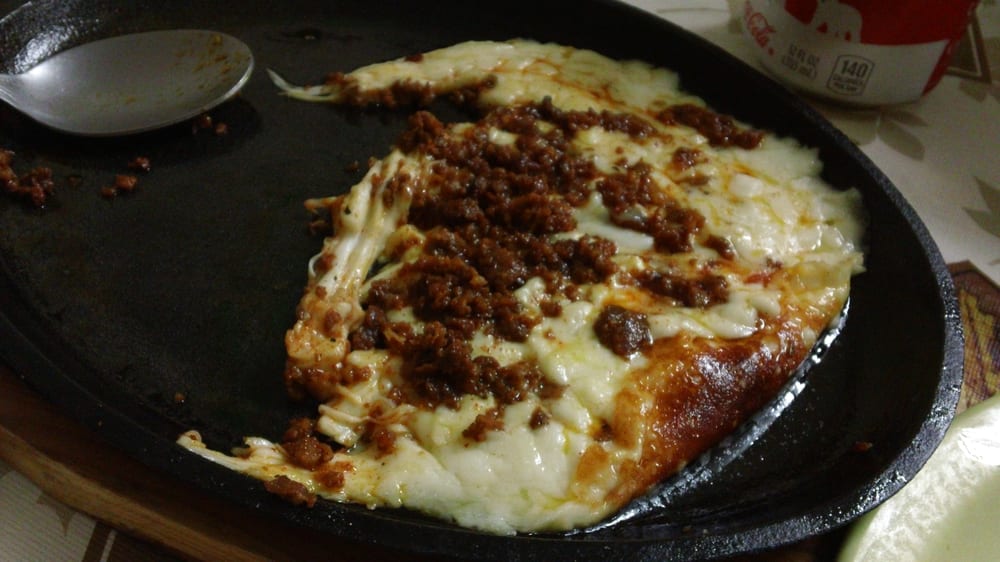 Carnes Asadas El Potrero Logo