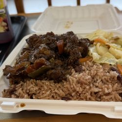 Island Flamed Lucky Hibachi - Brown Stew Chicken with Cabbage and Rice. Natural Beet, Carrot, and Ginger Juice.
