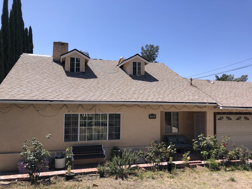 Slide of Safari Roofing and Remodeling