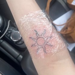 Living Canvas Tattoo and Piercing - Sun tattoo!! 3