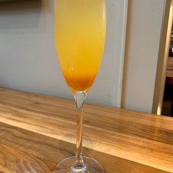 Mesler Kitchen Bar Lounge - Peach Mimosa - New American Near Me - Chicago, Illinois Mesler Kitchen Bar Lounge - Peach Mimosa - New American Near Me - Chicago, Illinois