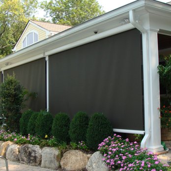 OC Quality Home Products - Motorized Power Screen enclosing veranda. - Shutters Near Me - Orange, California