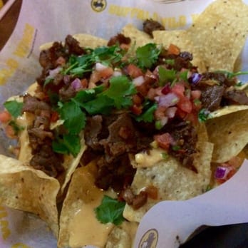 Buffalo Wild Wings - Ultimate Nachos! So good with queso sauce - Chicken Wings Near Me - Tracy, California Buffalo Wild Wings - Ultimate Nachos! So good with queso sauce - Chicken Wings Near Me - Tracy, California