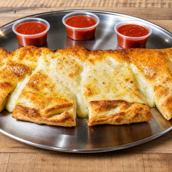 Manhattan NY - Calzone, Mozzarella cheese, ricotta cheese - Pizza Near Me - Fort Lauderdale, Florida Manhattan NY - Calzone, Mozzarella cheese, ricotta cheese - Pizza Near Me - Fort Lauderdale, Florida