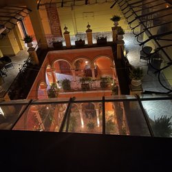 Casa del Poeta - View from the rooftop terrace looking down into the courtyard of hotel