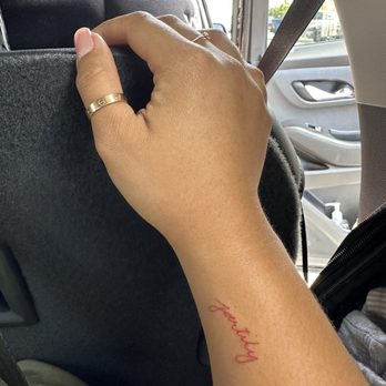 Soul Imagez Tattoo - Red ink script done by Kay - Tattoo Near Me - Dublin, California Soul Imagez Tattoo - Red ink script done by Kay - Tattoo Near Me - Dublin, California