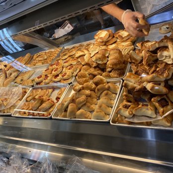 Sajouna Cafe - Meat pies and pastries in the case - Cafes Near Me - Dearborn Heights, Michigan