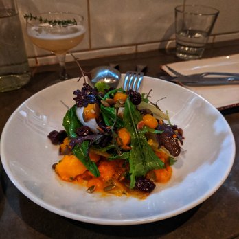 Richmond Station - Squash and Endive Salad ($14), shaved apples, dried cherries, maple vinaigrette, salted pepitas, baby greens - Canadian (New) Near Me - Toronto, Ontario