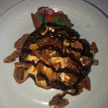 Nemo Grille - Pecan brownie with Mitchell salted Carmel ice cream. - New American Near Me - Avon, Ohio