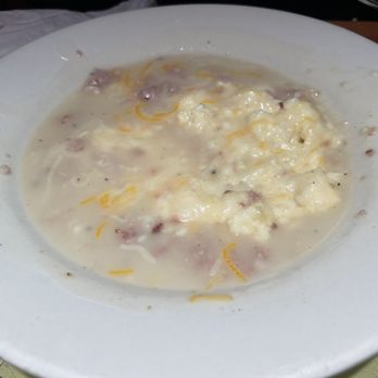 Shells of Melbourne - This is supposed be grits with shrimp and grits sauce, really!! - Seafood Near Me - Melbourne, Florida