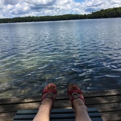 Blue Lake Pines Lodge & Suites - Sitting on a lounge chair on one of two docks on the property