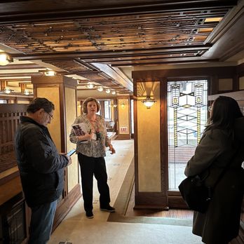 Frederick C Robie House - Mary at the top of the stairs from the first floor to the second floor - Landmarks & Historical Buildings Near Me - Chicago, Illinois