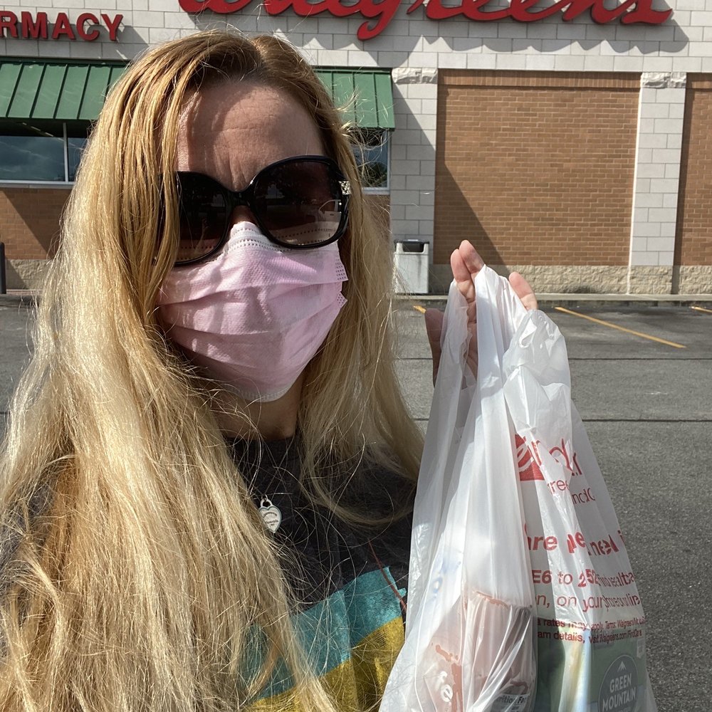 Walgreens - a woman wearing a face mask and holding a bag of groceries - Cosmetics & Beauty Supply Near Me - Jesup, Georgia Walgreens - a woman wearing a face mask and holding a bag of groceries - Cosmetics & Beauty Supply Near Me - Jesup, Georgia