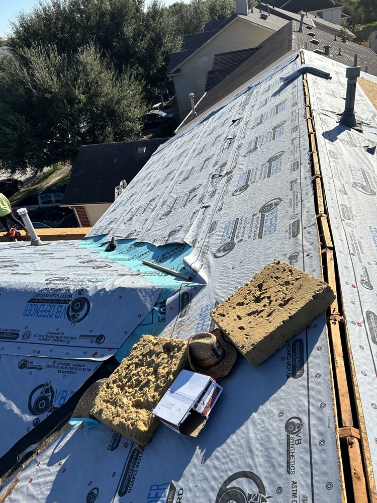 Slide of Mancia's Roofing Services