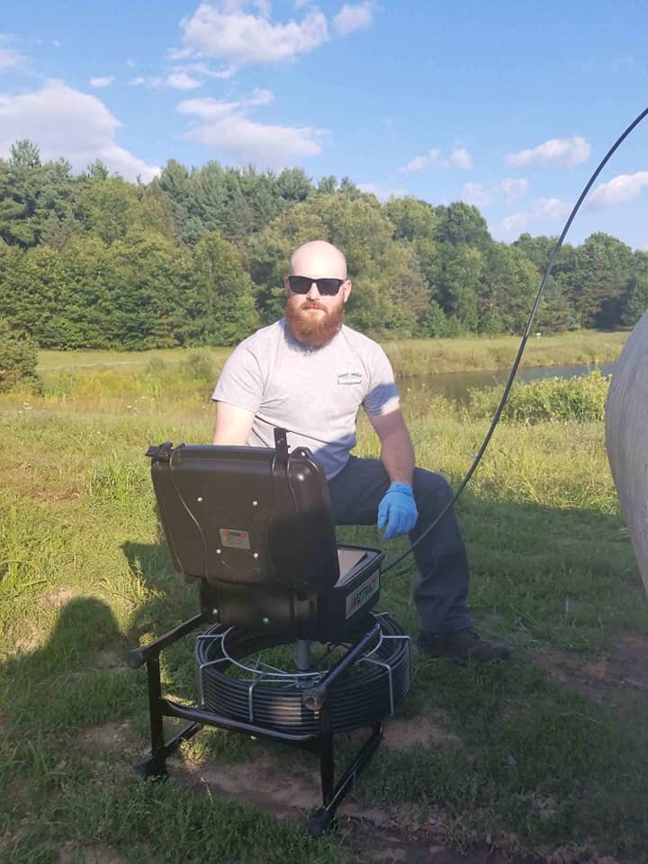 Slide of Caliber Sewer & Drain