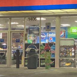 the front of a convenience store the front of a convenience store