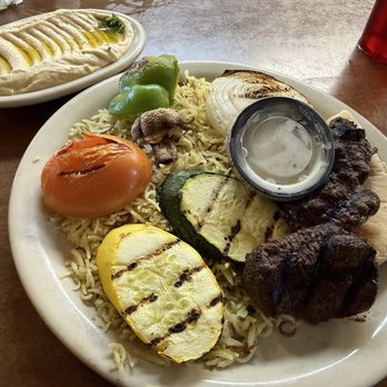 Prince Lebanese Grill - Mashwi Shish* plate with Vermicelli Rice, Grilled Veggies, Hummus, and Cucumber Sauce (Tzatziki). - Mediterranean Near Me - Arlington, Texas