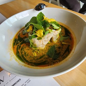 Cafe Rowan - Lobster and prawn dumpling for Portland Dumpling Week. Tom Kha broth was delicious.  I couldn't really justify the price though 3 for $14. - Breakfast & Brunch Near Me - Portland, Oregon