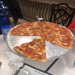 a half eaten pizza a half eaten pizza